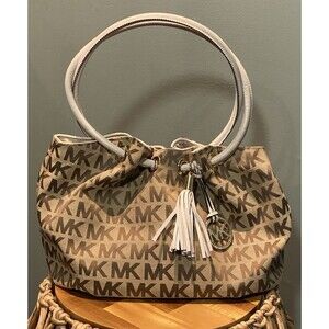 MICHAEL Michael Kors Purse Marina Signature Jacquard Drawstring Tassel HOBO Genu